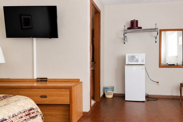 Queen bed and room furnishings
